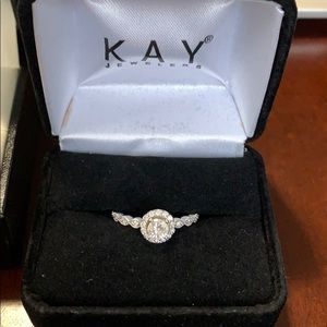 Halo round cut diamond engagement ring